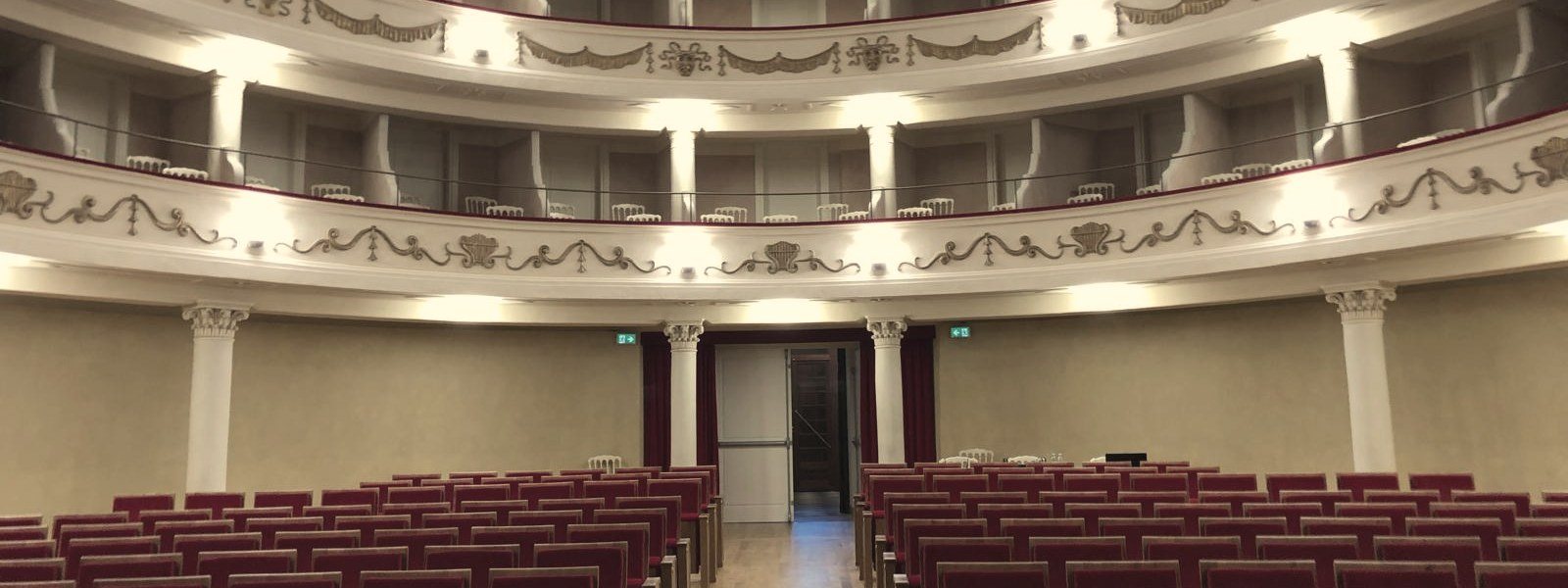Historic concert hall with boxes and balconies, the atmosphere of live classical music by Tonora
